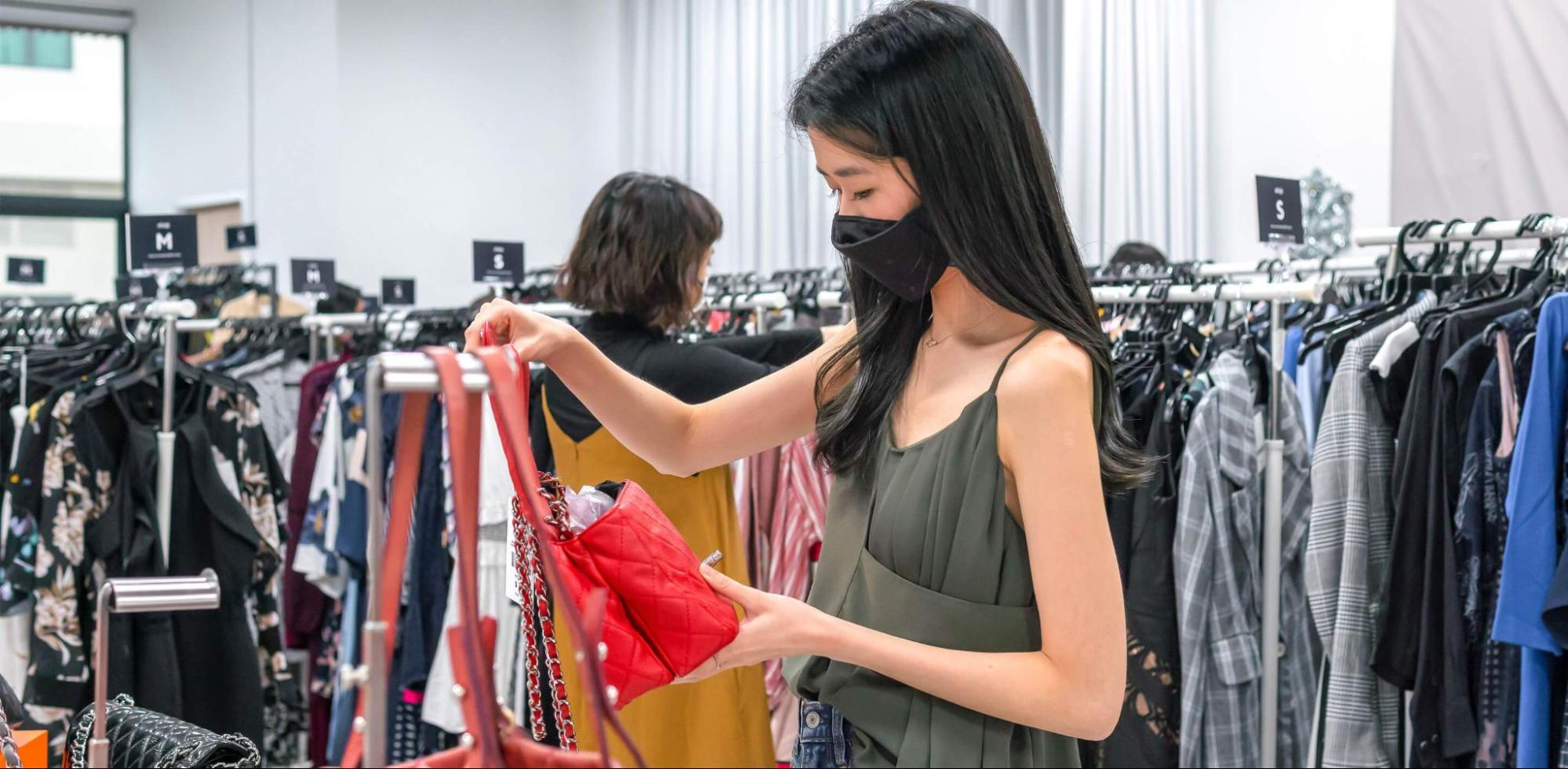 masked girl shopping