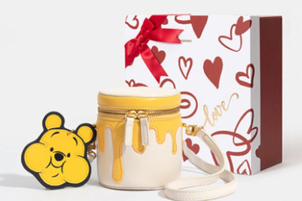 This Winnie The Pooh Honey Pot Bag Has Hunny Dripping Down