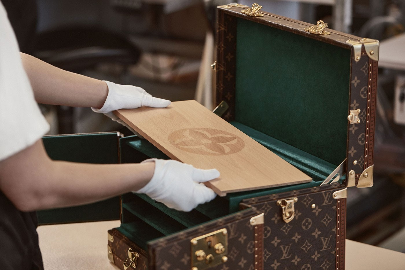 LOUIS VUITTON HAS A NEW MONOGRAMMED LUXE VANITY MAHJONG TRUNK WITH