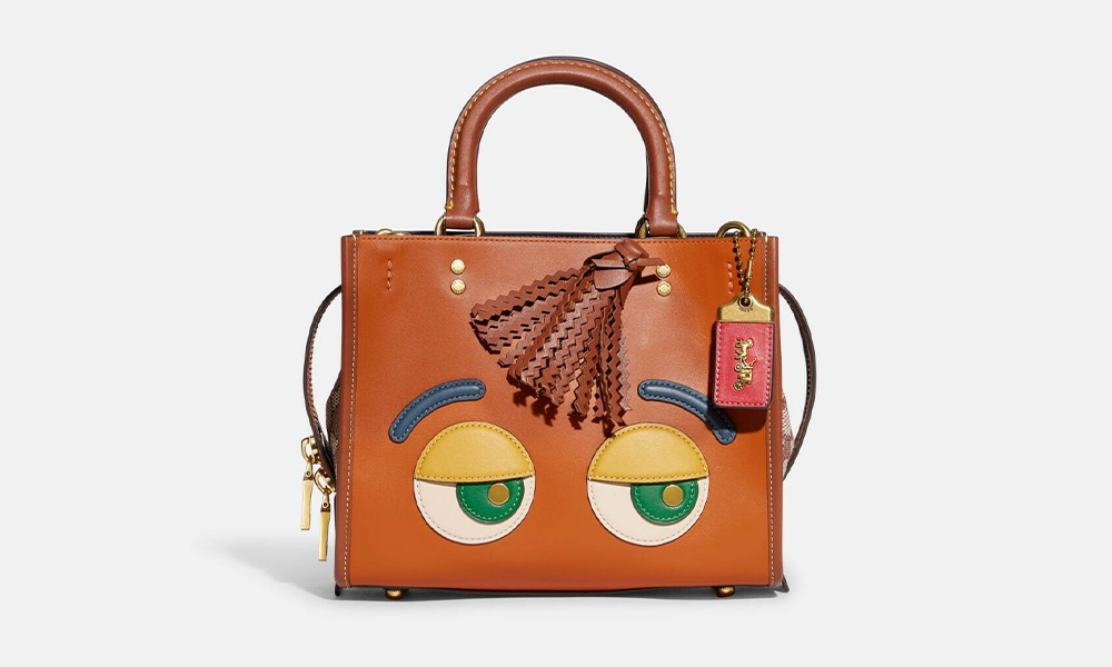 These New Coach Bags & Pouches Have Facial Expressions On Them