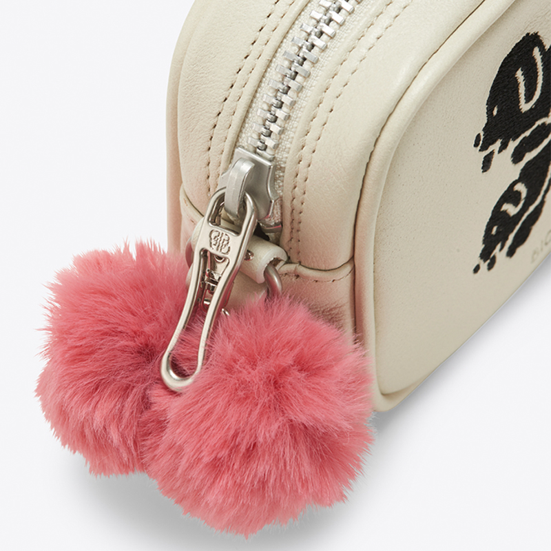 side of sling bag pink balls